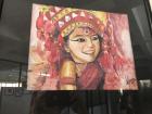 This is a painting of the Kumari (Vestal Virgin goddess) that a student at the Rato Bangala school painted.