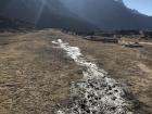 Welcome to the Syangboche airport runway! Notice all of the ice still on the ground even though the sun's out and we were wearing t-shirts