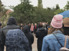 School-aged kids singing in the rain