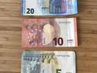 Some examples of Euro bills and coins