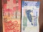 This is a five cedi bill and a one cedi bill. The five cedi is slightly wider than the one cedi. 