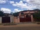 This is one of the houses on my road. It's very beautiful with a big wall.