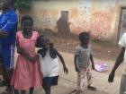 Some kids were playing outside of the bus I took to travel to the Northern region of Ghana