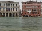 Flooded buildings across the canal