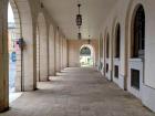 Walking down an arched street