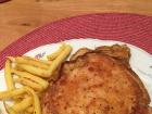 The typical German food is Schnitzel (fried pork usually, but this one is chicken) 