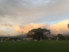 A beautiful sunset over the nearby soccer field 