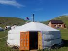 Yurts are sort of like round tents with stoves in the middle