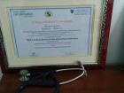 One of Dr. Okello's awards and his stethoscope