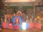 A shrine to the Buddha located inside a monastery. 