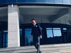One of my students standing outside the entrance to our school.