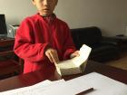 Jaydan searches through a dictionary so I know exactly what word he's talking about