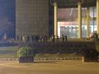 This group practices on the steps of a university building. They are learning a synchronized dance