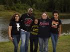 A picture of my family all wearing WWE shirts