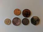 These are a 1p and 2p coin, and underneath are 5p, 10p, 20p and 50p coins 