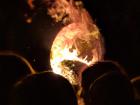 Selected locals run through the streets carrying flaming tar barrels