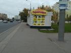 There is some sort of food stand to satisfy the hungry passengers near almost every bus stop