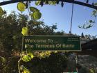 A welcome sign to the terraces