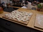 Finishing making pierogi before frying