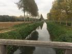 A beautiful stream surrounded by farmland