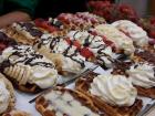 Brussels waffles are often topped with whipped cream, chocolate and fruit