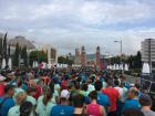 People lined up to begin the 10K in Plaça Espanya.