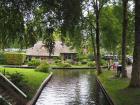 A look down a "street" in Giethoorn - a city in The Netherlands that has no roads or cars, only boats and canals!