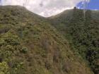 The lively green fields along the side of the Volcán Pichincha