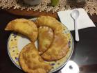 In this picture are fried empanadas made by my host mom. They are so delicious with a sprinkle of sugar on top.