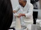 The vase is formed step by step using steady pressure and motion