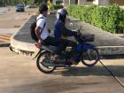 We can ride around our school on motorcycles