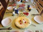 A traditional Austrian meal with sliced cheese, meat, bread and spreads