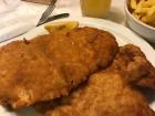 Wiener Schnitzel, a famous Austrian dish made of flattened beef that is breaded and fried