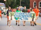My friends and I in a parade for our club, Students for Environmental Action