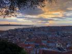 The red roofs and sandstone buildings in Portugal are similar to the ones in Spain