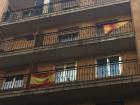 Spaniards are so proud of their flag that they hang it on their balconies
