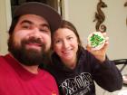 Abby's first cookie is decorated with a Christmas tree.