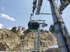 Each cable car in the Mi Teleférico system can hold up to eight people