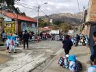 Students and parents waiting outside of the school in Mallasa