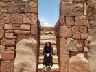 Abby on the steps at Tiwanaku 