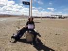 Abby hitch-hiking at the Argentina border