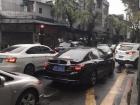 Midday traffic in Guangzhou, a city with over 13 million people