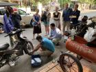 Our tuk-tuk getting repaired after running over a nail