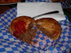 Here's a traditional Aussie meat pie, like a chicken pot pie but with beef...  people love putting ketchup on it ("tomato sauce" here), but I'm not so keen on it 