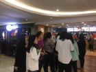 A group of people waiting in line to have Burger King (when there's so much great Indonesian food around!)