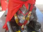 A statue of a cow at a Hindu temple