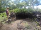 Lizzy at the entrance to one of six lava tubes!