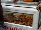 Snack stand selling gateaux and dholl puri