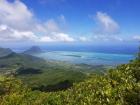 Can you see the line of white waves crashing around the island?