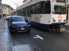 The metro alongside cars 